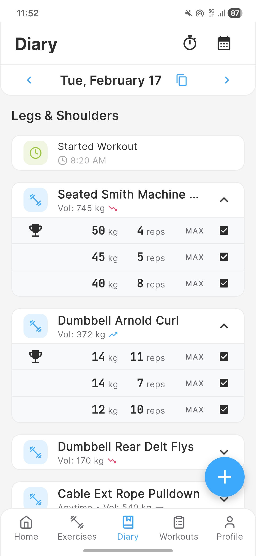 Chalk diary showing a day's workout with exercises, sets, weights, and reps